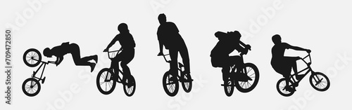 Set of silhouettes of BMX cyclist. Isolated on white background. Graphic vector illustration.