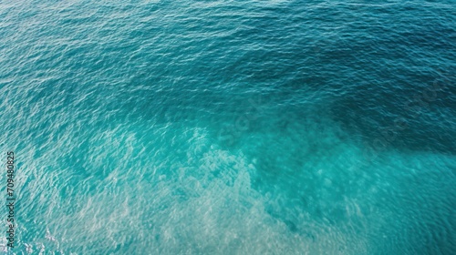 Blue sea water surface texture background. Top view of ocean
