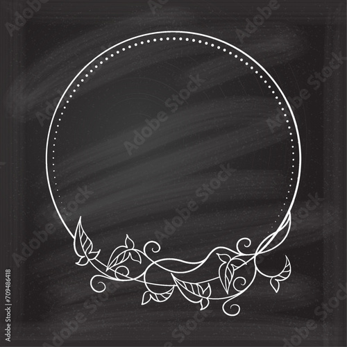 Vector round floral frame with ivy leaves decoration. Vintage style ivy stems wreath on a chalkboard background