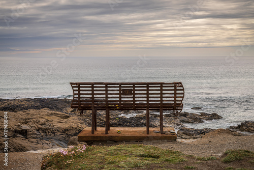 An old rusty bench in Treyarnon Bay, Cornwall, England, UK