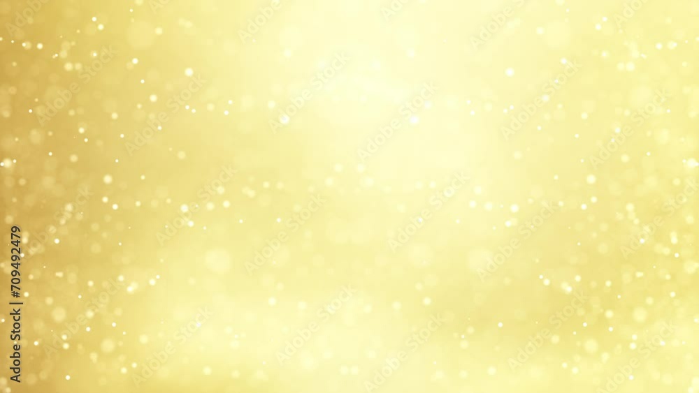 Gold defocused bokeh particles lights shiny smooth motion background. Particles shiny bokeh lights glow moving and flickering luxury background. Gold defocused bokeh particles lights shiny smooth motion background. Particles shiny bokeh lights glow moving and flickering luxury background.