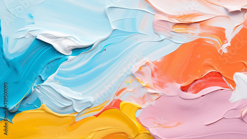 A detailed close-up of a vibrant painting with multiple colors.