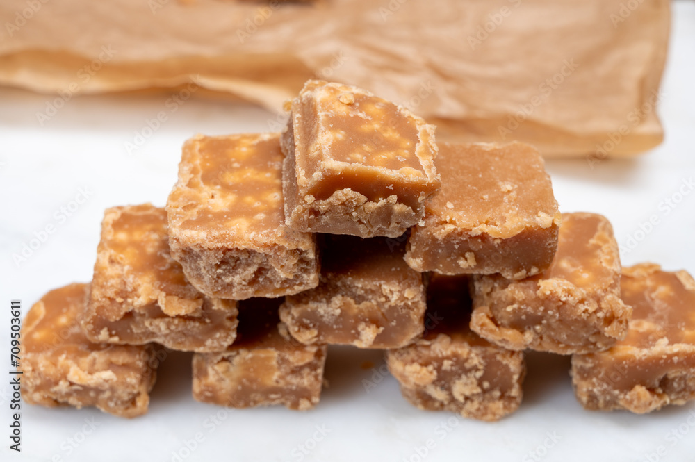 American sweets, homemade butter fudges, confection made by mixing sugar, butter and milk American sweets, homemade butter fudges, confection made by mixing sugar, butter and milk
