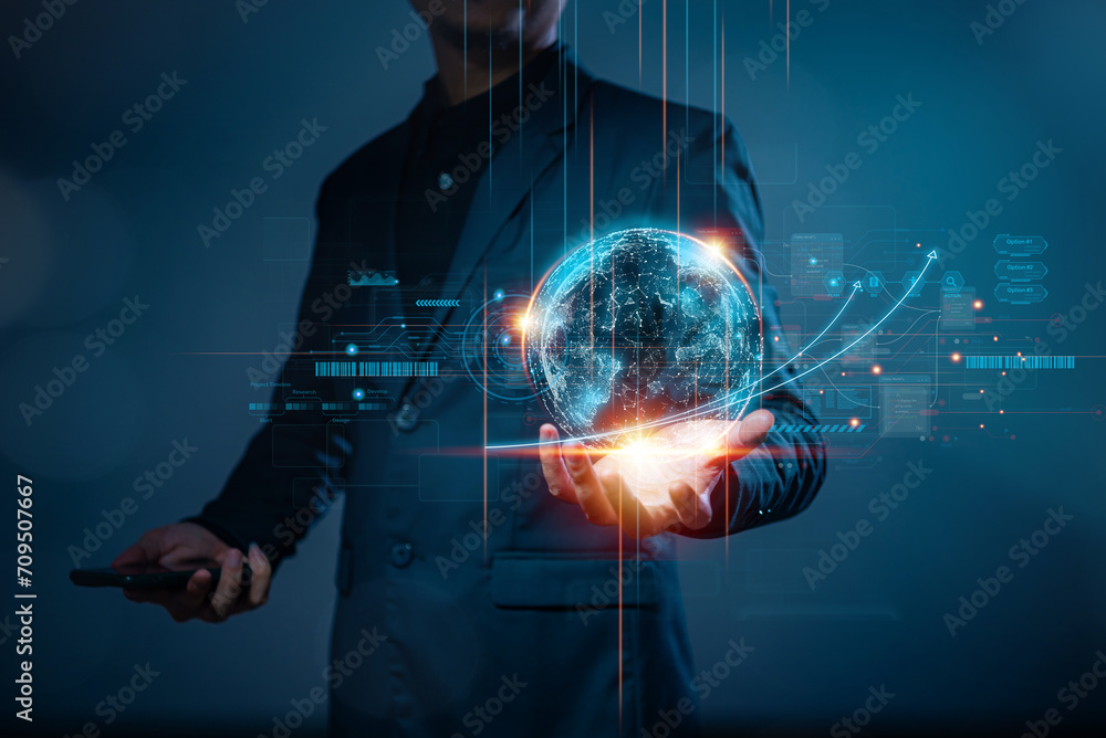Businessman holding hologram of Global business network connection, Analyzation big data and business intelligence concept, Global business and digital link tech. Businessman holding hologram of Global business network connection, Analyzation big data and business intelligence concept, Global business and digital link tech.