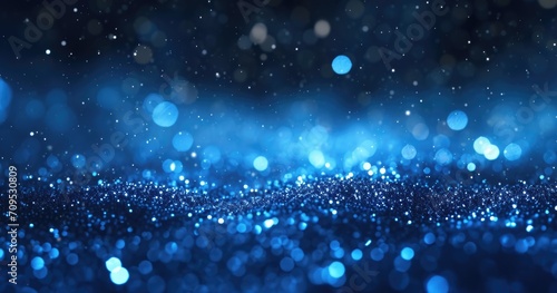 blue glitter with light effects and bokeh effect
