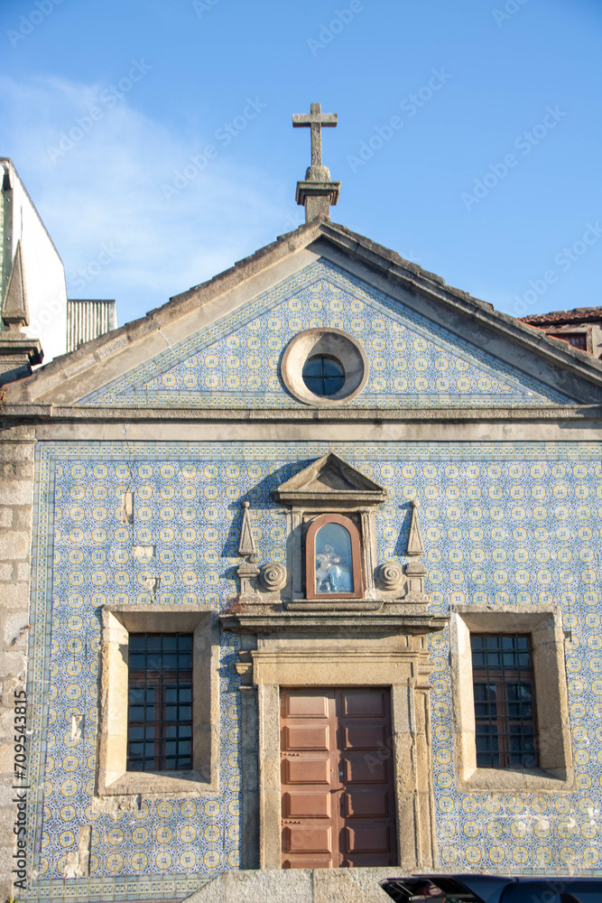 Small church covered with blue tiles on Porto River bank