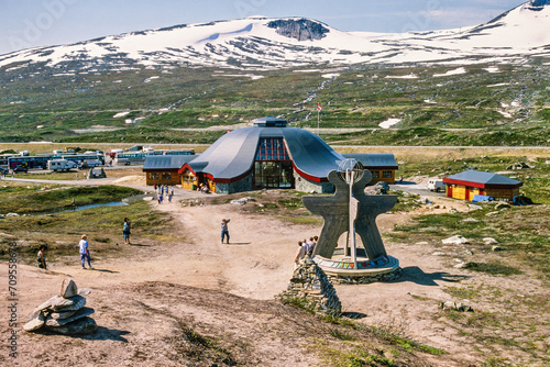 Arctic circle center in Norway with tourists photo