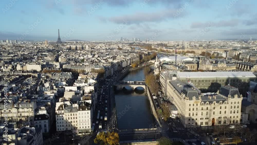 Drone flying over the River Seine in Paris, with the Eifel Tower in the background on the left side Drone flying over the River Seine in Paris, with the Eifel Tower in the background on the left side