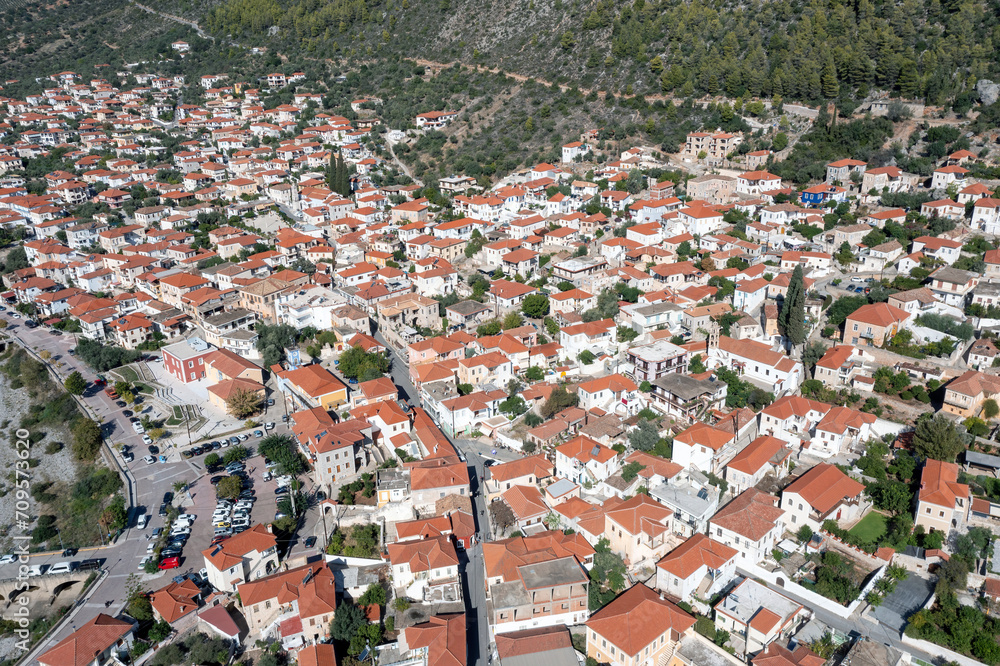 Leonidio, Arcadia, Peloponnese, Greece. Aerial drone view panoramic of town, dry Dafnon river bed.