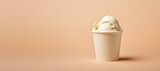 ice cream in paper cup on beige background