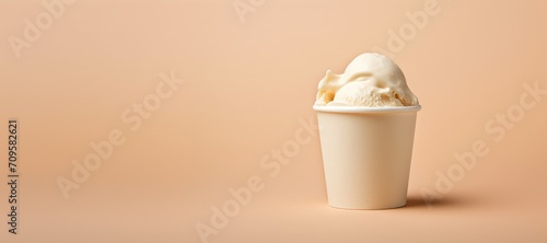 ice cream in paper cup on beige background