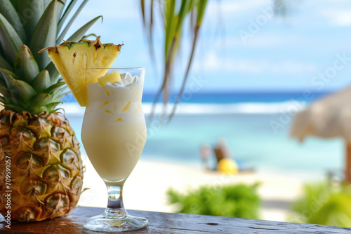 Refreshing Pina Colada, Garnished With Cream And Pineapple, Beside Tropical Beach Bar
