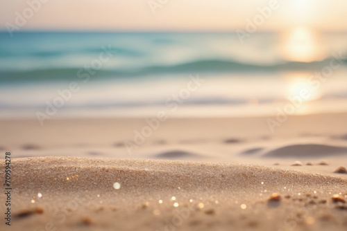 Seascape abstract beach background. blur bokeh light of calm sea and sky. Focus on sand foreground