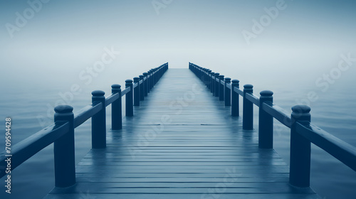 a long dock that leads to the water photo