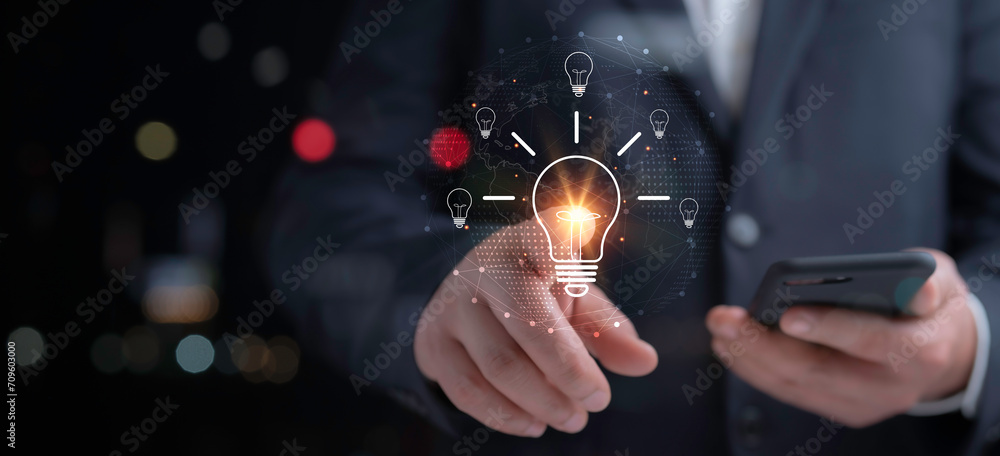 Smart business intelligent creativity with bulbs, Motivation and innovation concept.Businessman touch of icon lightbulb for idea concept, idea, innovation and inspiration, - obrazy, fototapety, plakaty 