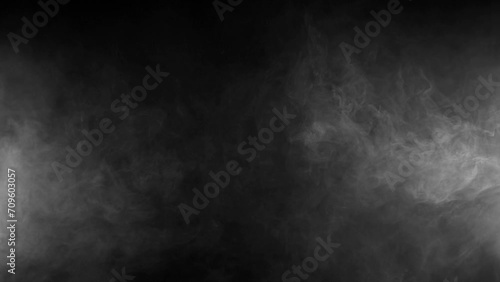 Super Slow Motion of White Smoke Texture Isolated on Black Background. Filmed on High Speed Cinema Camera. photo