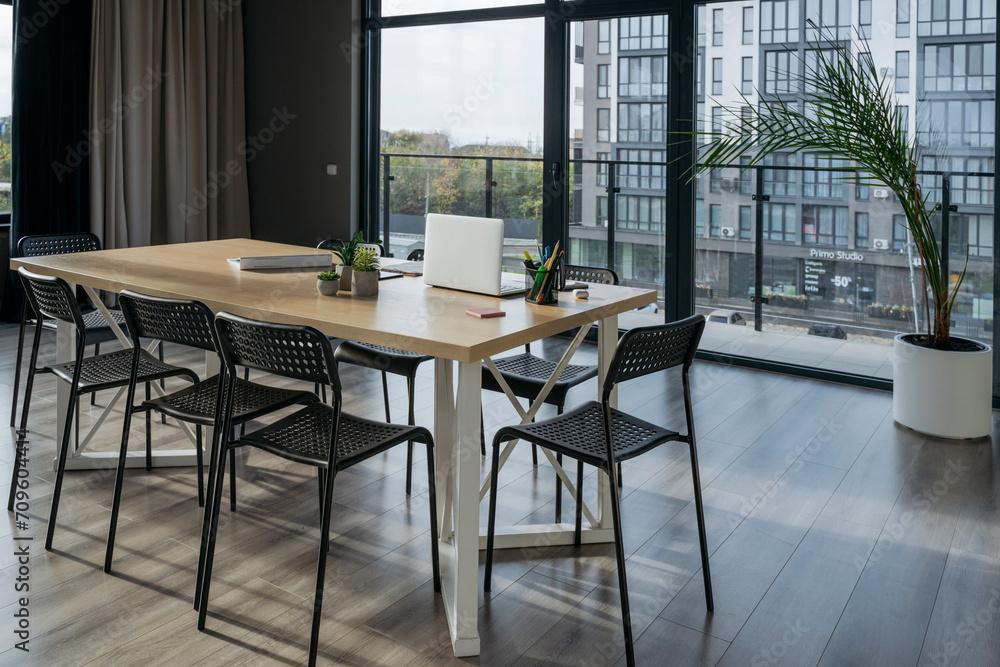 Table and chairs in meeting room at office Table and chairs in meeting room at office