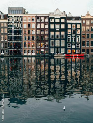Canal houses by Amstel River, Amsterdam, Netherlands photo