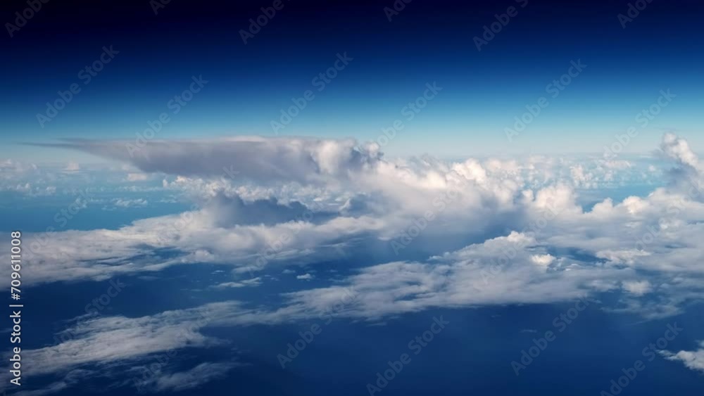 Air plane window view time lapse clouds and blue sunny sky, Loop of white clouds over blue sky with sun Rays, Aerial view, drone shooting clouds motion time, nature blue sky a white cleat weather. 4K. Air plane window view time lapse clouds and blue sunny sky, Loop of white clouds over blue sky with sun Rays, Aerial view, drone shooting clouds motion time, nature blue sky a white cleat weather. 4K.