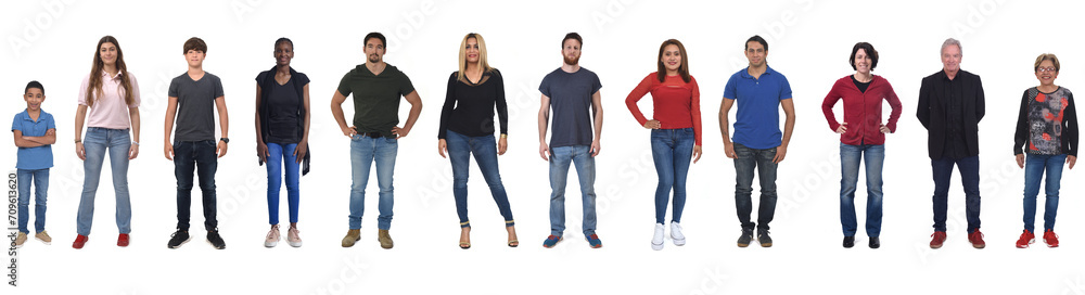 front view of a group of women and men of various ages dressed in jeans on white background front view of a group of women and men of various ages dressed in jeans on white background