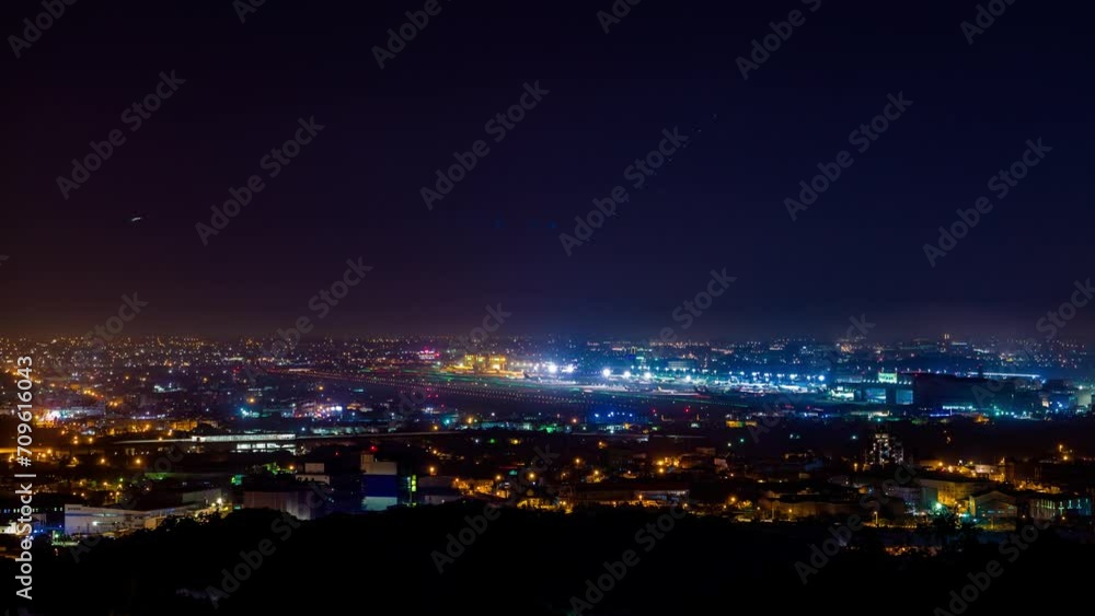 time lapse photography asia International Airport, airplane taking off and landing at night, beautiful trail Taiwan