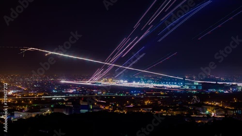 time-lapse photography asia International Airport, planes taking off and landing at night, make a long beautiful trail CKS internation airport taiwan