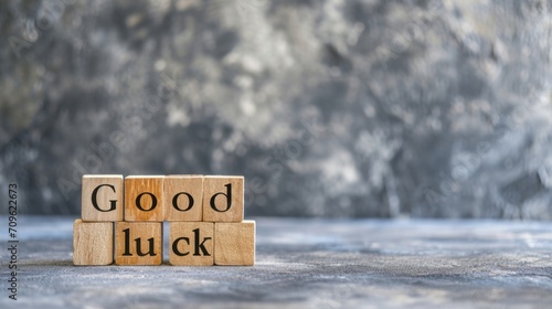 Good luck symbol. Wooden blocks with words Good luck. Beautiful grey green background with succulent plant. Business and Good luck concept. Copy space