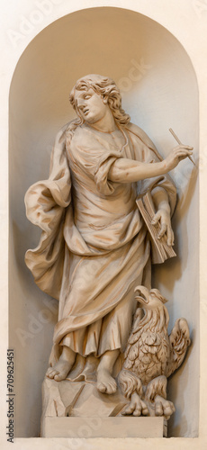 VICENZA, ITALY - NOVEMBER 6, 2023: The carved satue of St. John the Evanglist in the church Chiesa di San Filippo Neri by Orazio Marinali (1643 – 1720).