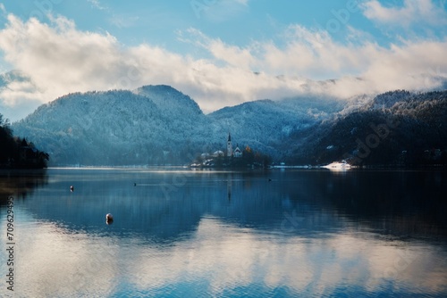 misty lake bled , view on island with a church