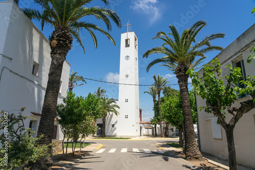 Street of the fishers village of Poble Nou del Delta with its typical white houses. Delta del Ebro, Tarragona, Spain.
