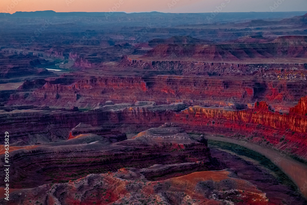 Landscape of the Grand Canyon with a bend in the river at sunset
