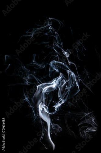 Fototapeta Naklejka Na Ścianę i Meble -  Smoke jets on black background
