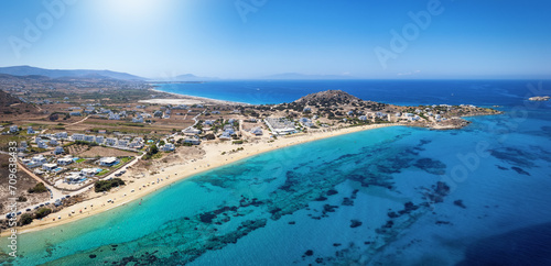 Fototapeta Naklejka Na Ścianę i Meble -  Panoramic aerial view of the beach at Mikri Vigla with fine sand and turquoise shining sea, Naxos island, Greece