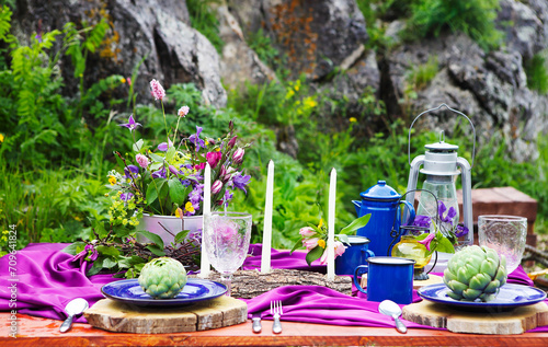 Wedding table setting decorated in rustic style © Dasha Petrenko