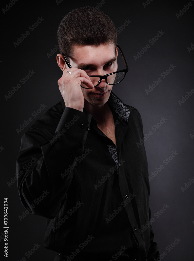 Fototapeta premium Close up portrait of a handsome man in glasses