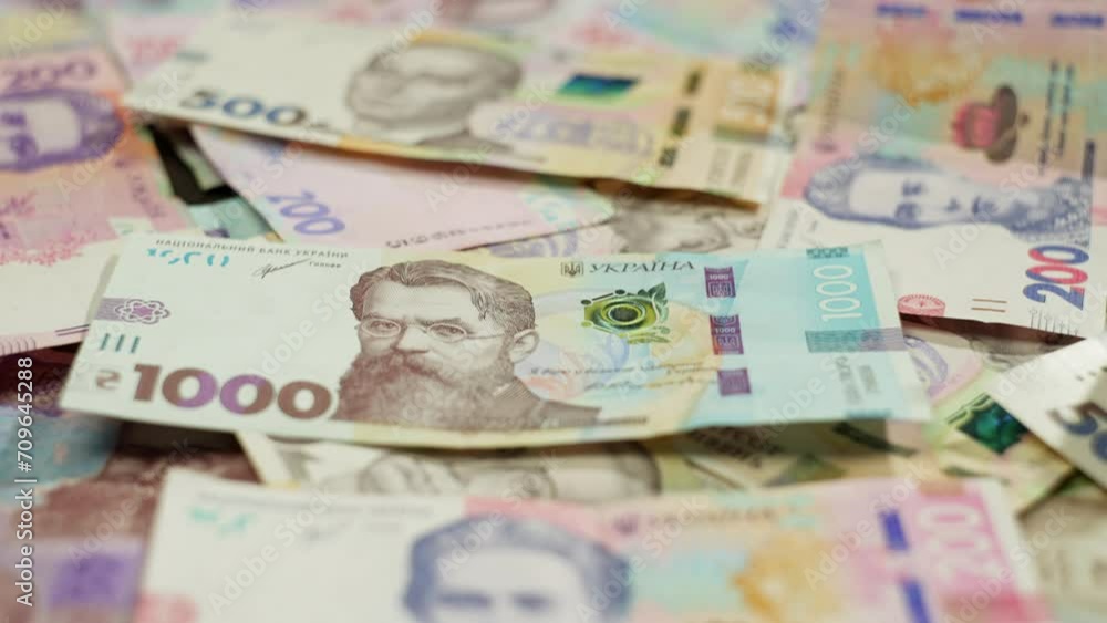 Camera movement over banknotes of different denominations. The hryvnia is the national currency of Ukraine. High quality 4k footage Camera movement over banknotes of different denominations. The hryvnia is the national currency of Ukraine. High quality 4k footage