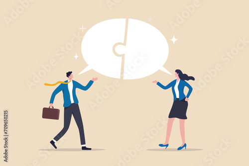 Communicate solution to solve problem, agreement, teamwork or cooperation, conversation message, meeting or discussion concept, business people communicate with connected jigsaw puzzle speech bubble. photo