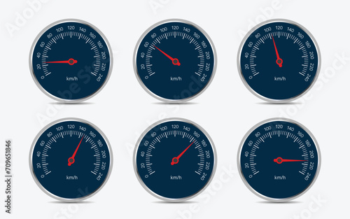 Illustration of speedometers with red pointer, white numbers and chrome circular frame.