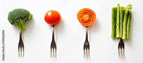Food decoration of various Fresh vegetables on a fork isolated on white background. Generate AI