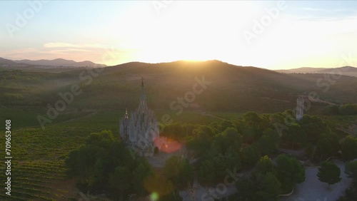 Virgin of Montserrat Hermitage and vineyards at sunset. Montferri, Tarragona photo