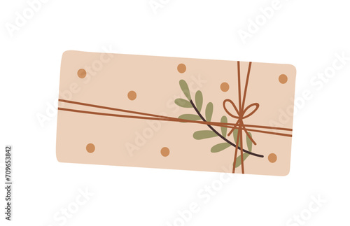 Gift box in paper wrapping, leaf branch decoration. Present design with plant...