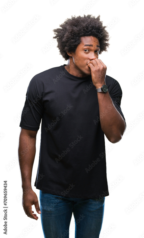 Afro american man over isolated background looking stressed and nervous with hands on mouth biting nails. Anxiety problem. Afro american man over isolated background looking stressed and nervous with hands on mouth biting nails. Anxiety problem.