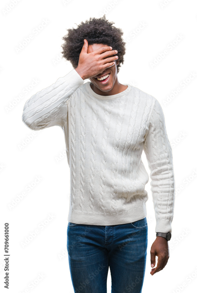 Afro american man over isolated background smiling and laughing with hand on face covering eyes for surprise. Blind concept. Afro american man over isolated background smiling and laughing with hand on face covering eyes for surprise. Blind concept.