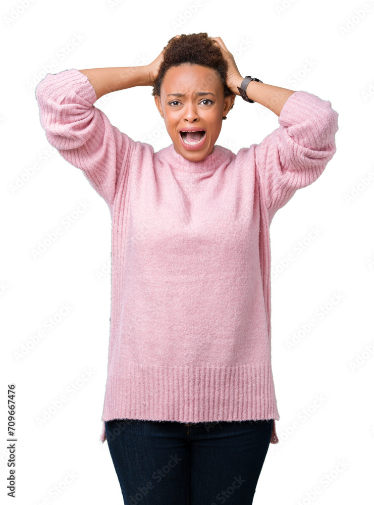 Beautiful young african american woman over isolated background Crazy and scared with hands on head, afraid and surprised of shock with open mouth Beautiful young african american woman over isolated background Crazy and scared with hands on head, afraid and surprised of shock with open mouth