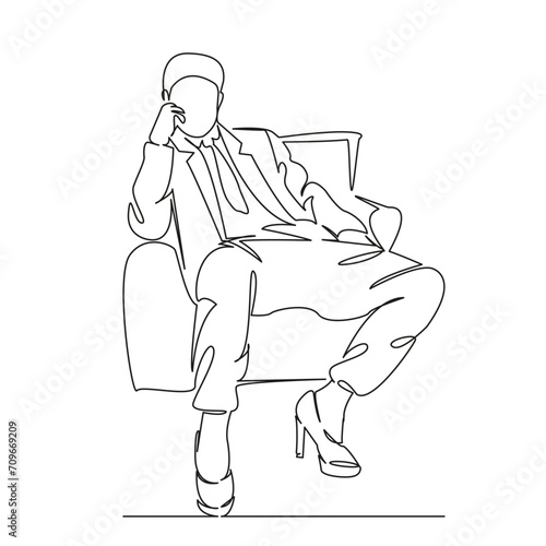 man in a business suit and stilettos