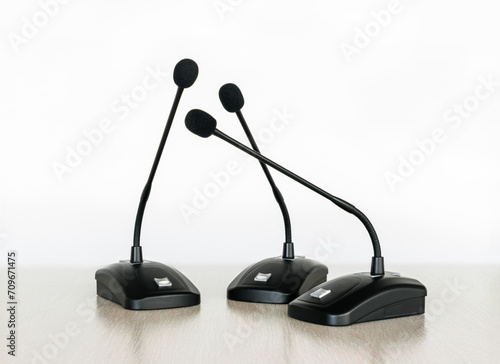 Valokuva Group of Tabletop Cardioid Gooseneck Microphones for Conferences