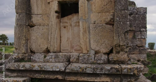 Close tilt up of Tomb A18 in the ancient Necropolis of Hierapolis. photo