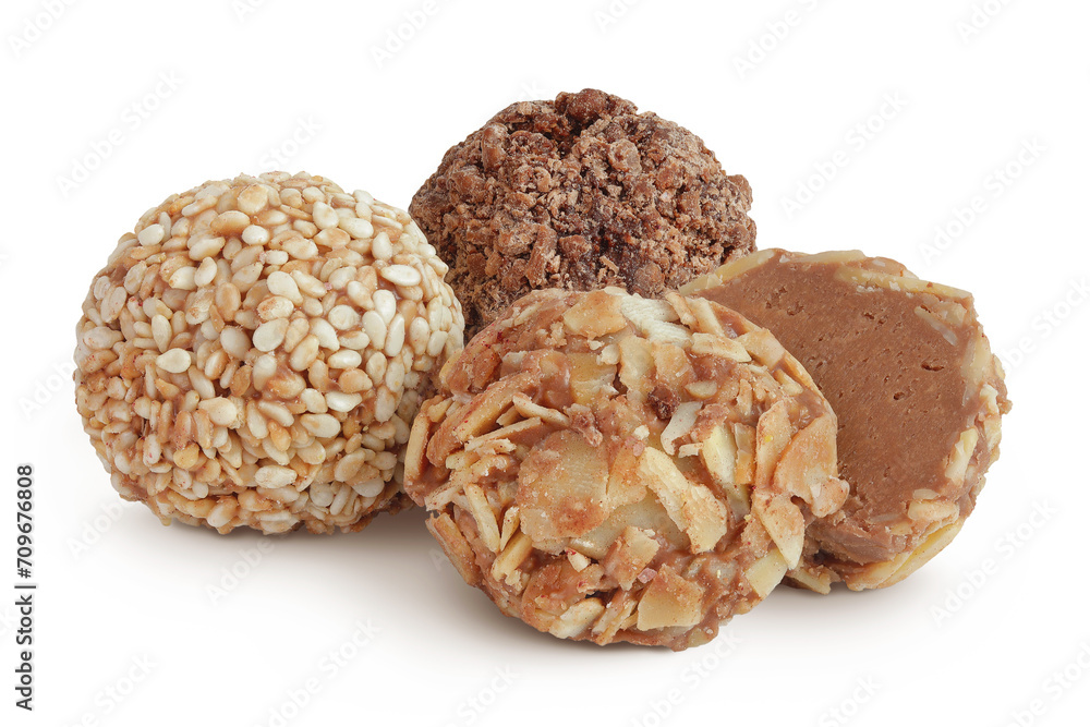 A variety of different truffles Isolated on a white background A variety of different truffles Isolated on a white background