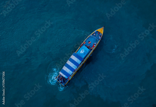 Aerial view with  the  speed of motor boat on open sea view © SASITHORN