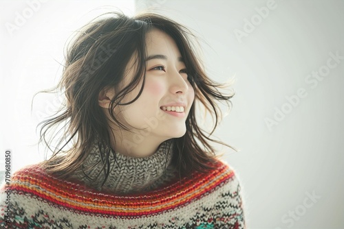 セーターを着た日本人女性のポートレート（美容・婚活・結婚・バレンタイン） photo
